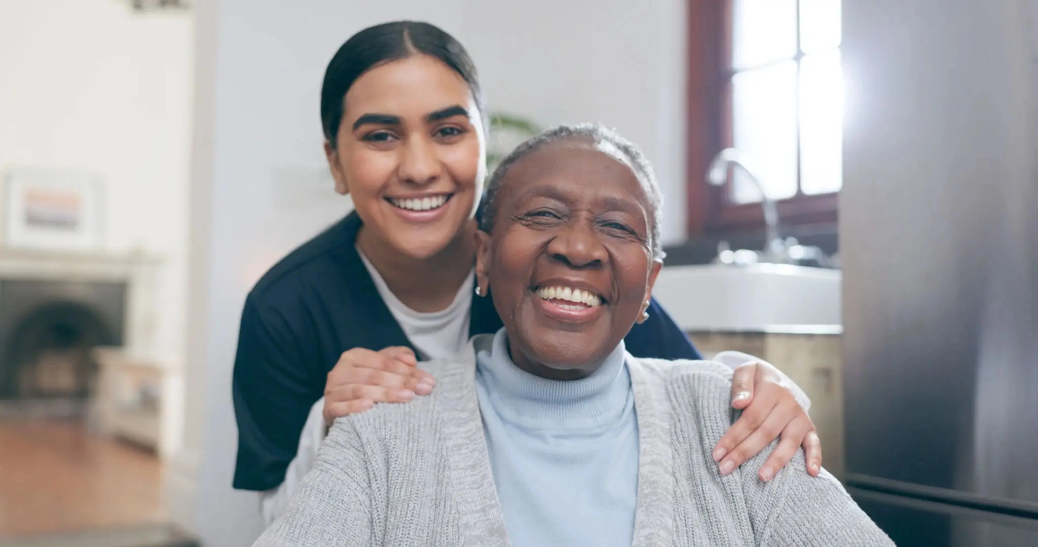 Happy senior with supportive caretaker